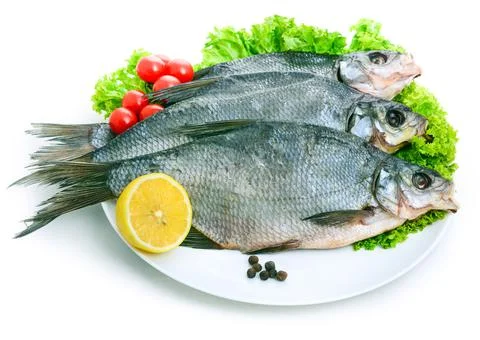 Cured carp on a platter Stock Photos