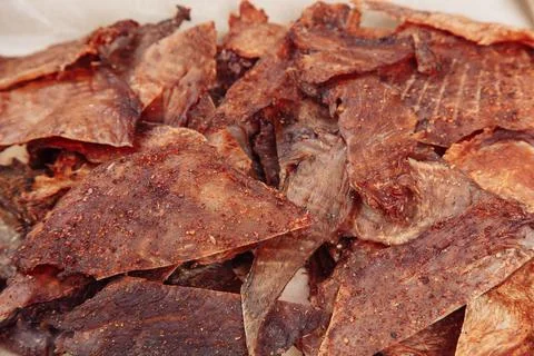 Cured meat full frame meat close-up. small, thin pieces cut into Stock Photos