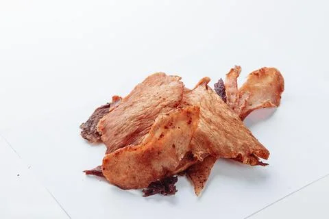 Cured meat full frame meat close-up. small, thin pieces cut into Stock Photos
