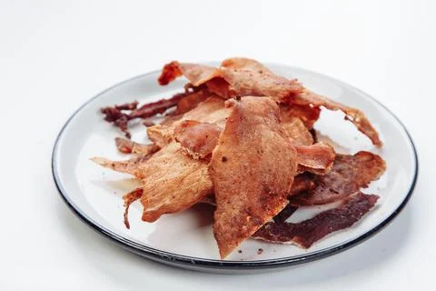 Cured meat full frame meat close-up. small, thin pieces cut into Stock Photos