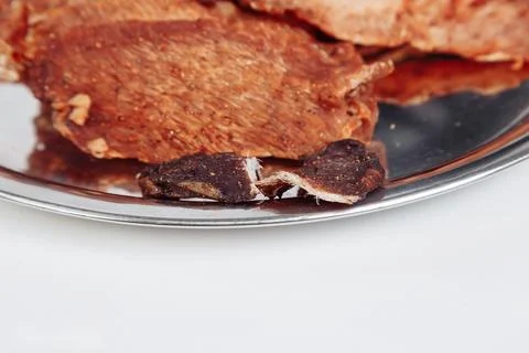 Cured meat full frame meat close-up. small, thin pieces cut into Stock Photos