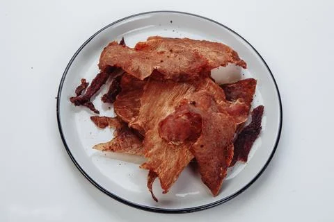 Cured meat full frame meat close-up. small, thin pieces cut into Stock Photos