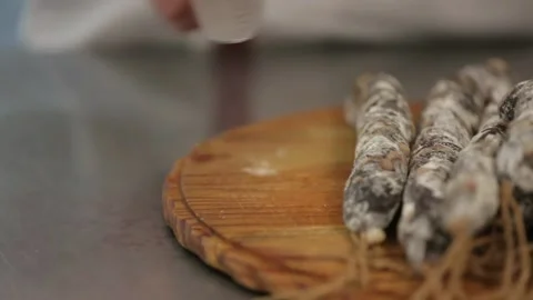 Cured sausage with mold on a board Stock Footage 146649308