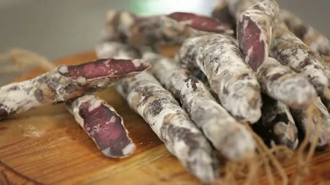 Cured sausage with mold on a board Stock Footage 146649359