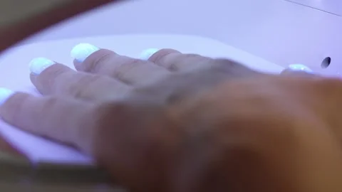 Curing Gel Nails Under UV Lamp in Nail Salon Stock Footage 308516528