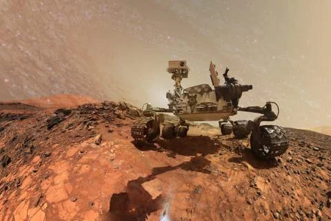 Curiosity Mars Rover exploring the surface planet of Mars. Stock Photos