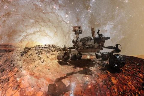 Curiosity Mars Rover exploring the surface planet of Mars. Stock Photos