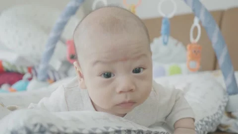 Curious Baby Exploring Play Area Stock Footage 313831133