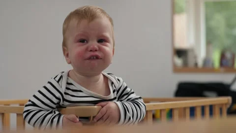 Curious Baby with Expression in Playroom Stock Footage 303499090