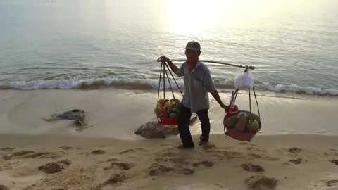 Curious Beach Vendor at Long Beach, Phu Quoc, Vietnam Stock Footage 130707833