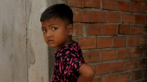 Curious Boy looking at Camera Stock Footage 12169493
