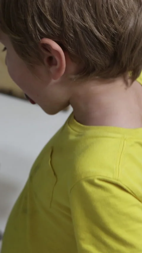 Curious child exploring cooking on stove Stock Footage 326769709