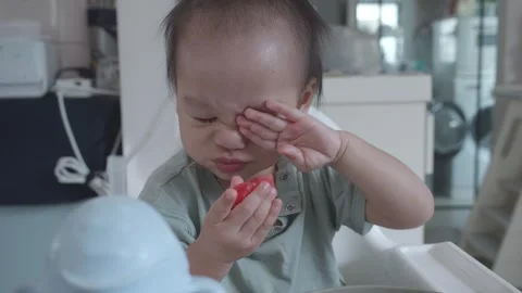 Curious Child Exploring New Food 스톡 동영상 344032172