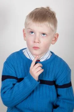 Curious child thinking Stock Photos