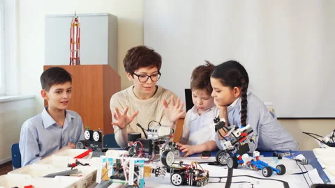 Curious children learn programming using laptops on extracurricular classes Video stock 98088044