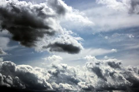 Curious clouds Stock Photos