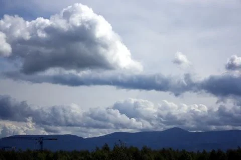 Curious clouds Stock Photos