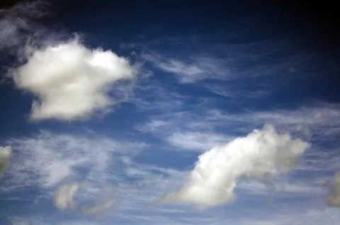 Curious clouds  Stock Photos