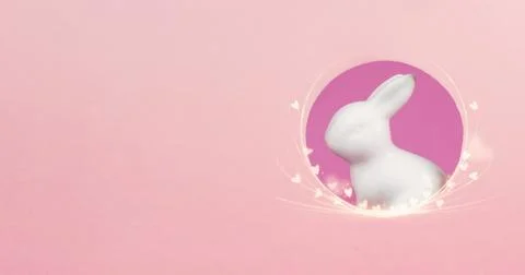 Curious easter bunny or rabbit peeking through a hole, holiday in spring Stock Photos