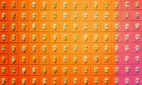 Curious facade with human faces, korca- albania Stock Photos