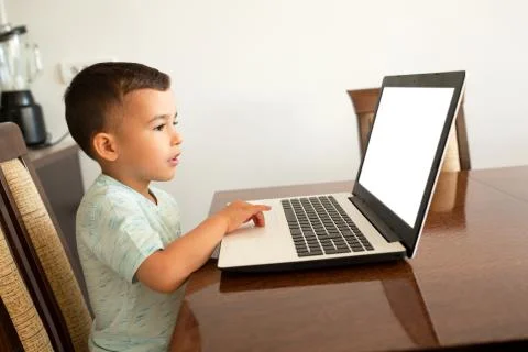 Curious kid exploring virtual world Stock Photos