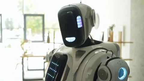 Curious robot looking into camera Stock Footage 81030322