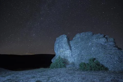 Curious stone formations under the night stars Stock Photos