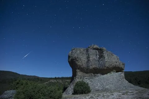 Curious stone formations under the night stars Stock Photos