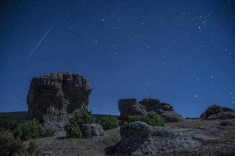 Curious stone formations under the night stars Stock Photos
