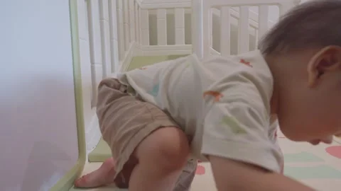 Curious Toddler Exploring a Bright Playroom Vidéo 341142701