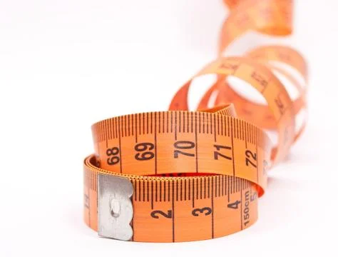 Curled measuring tape Stock Photos