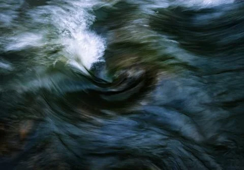 Curled ripples on the river Stock Photos