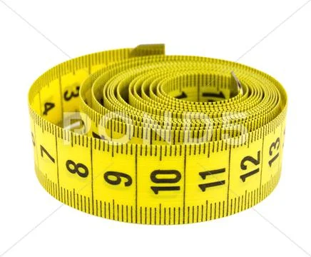 Curled yellow measuring tape Stock Photos