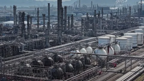 Curling fire and cumin smoke filling the sky. Smoking chimneys from the factory Stock Footage 324874995