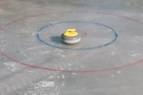 Curling stone Stock Photos