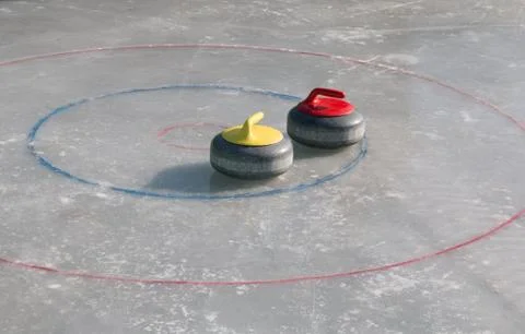 Curling stone Stock Photos