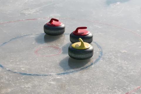 Curling stone Stock Photos