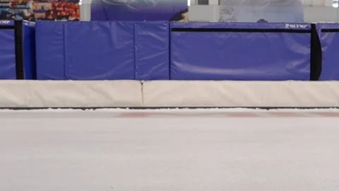 The Curling stone slides on the ice from left to the right Video stock 133702392