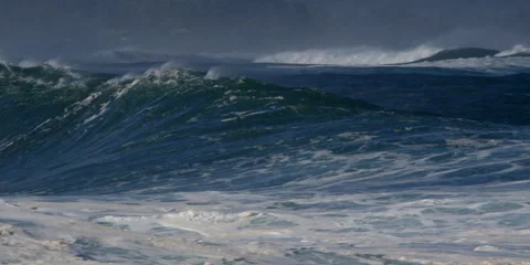 A curling wave breaking in foam on a rocky reef Stock Footage 59526686