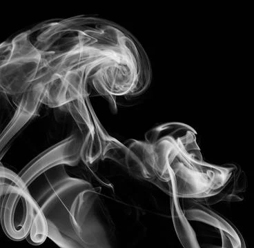 Curly clouds of grey smoke Stock Photos