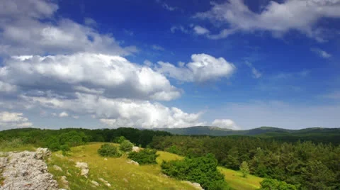 Curly clouds over the Ay-Petri mountains in FullHD Stock Footage 24686017