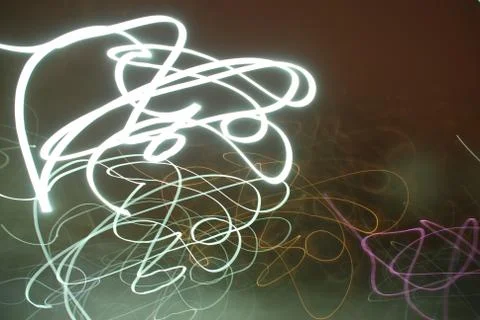 Curly glowing lines Stock Photos