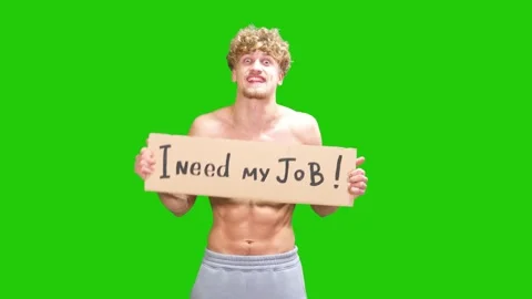 Curly guy happily looking for new job with a sign in his hands on green screen Stock Footage 170311987