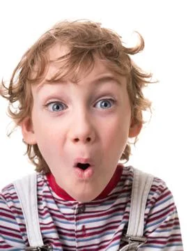 Curly-haired boy surprised Stock Photos