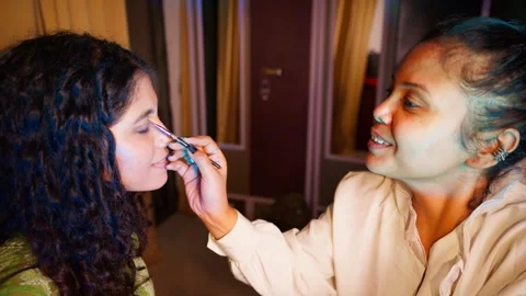 Curly haired client sits calmly in bright studio Video stock 305958376