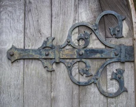 Curly iron hinge Stock Photos