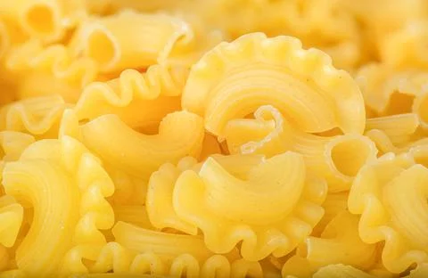 Curly pasta background Stock Photos