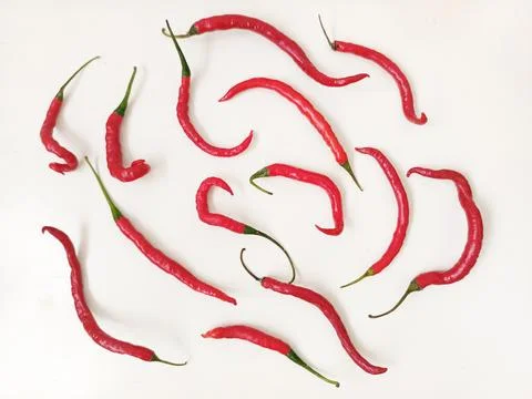 Curly red chilis pattern Foto stock