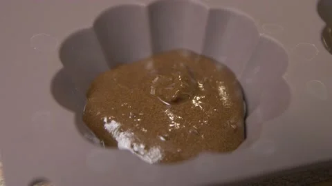 The Curly Shape Is Filled With Melted Chocolate. At the bottom of the Seeds. Clo Stock Footage 182298061