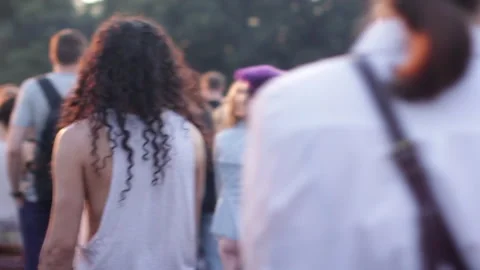 Curly young guy dancing rhythmically at outdoor summer music concert 스톡 동영상 165685149